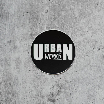 Urban Werks Classic Logo Circle Sticker Black Background with White Text